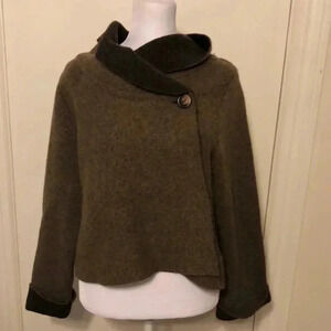 ChiaraMente brown sweater with button at neck.